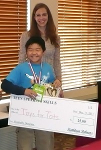 Public speaking graduate Bryan bbrightens the holidays for children in San Diego by supporting Toys for Tots!